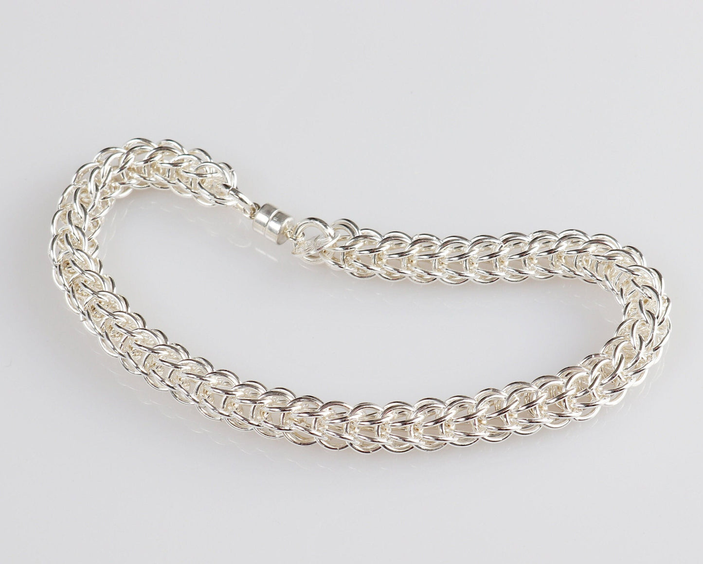 A 935 sterling Argentium Silver Full Persian Weave bracelet, crafted in our Missouri studio. This eye-catching versatile full Persian weave bracelet features a magnetic clasp that holds securely, yet opens and closes easily. Argentium 935 is known for its tarnish resistant hypoallergenic qualities and contains more pure silver than the typical .925 Sterling silver. 