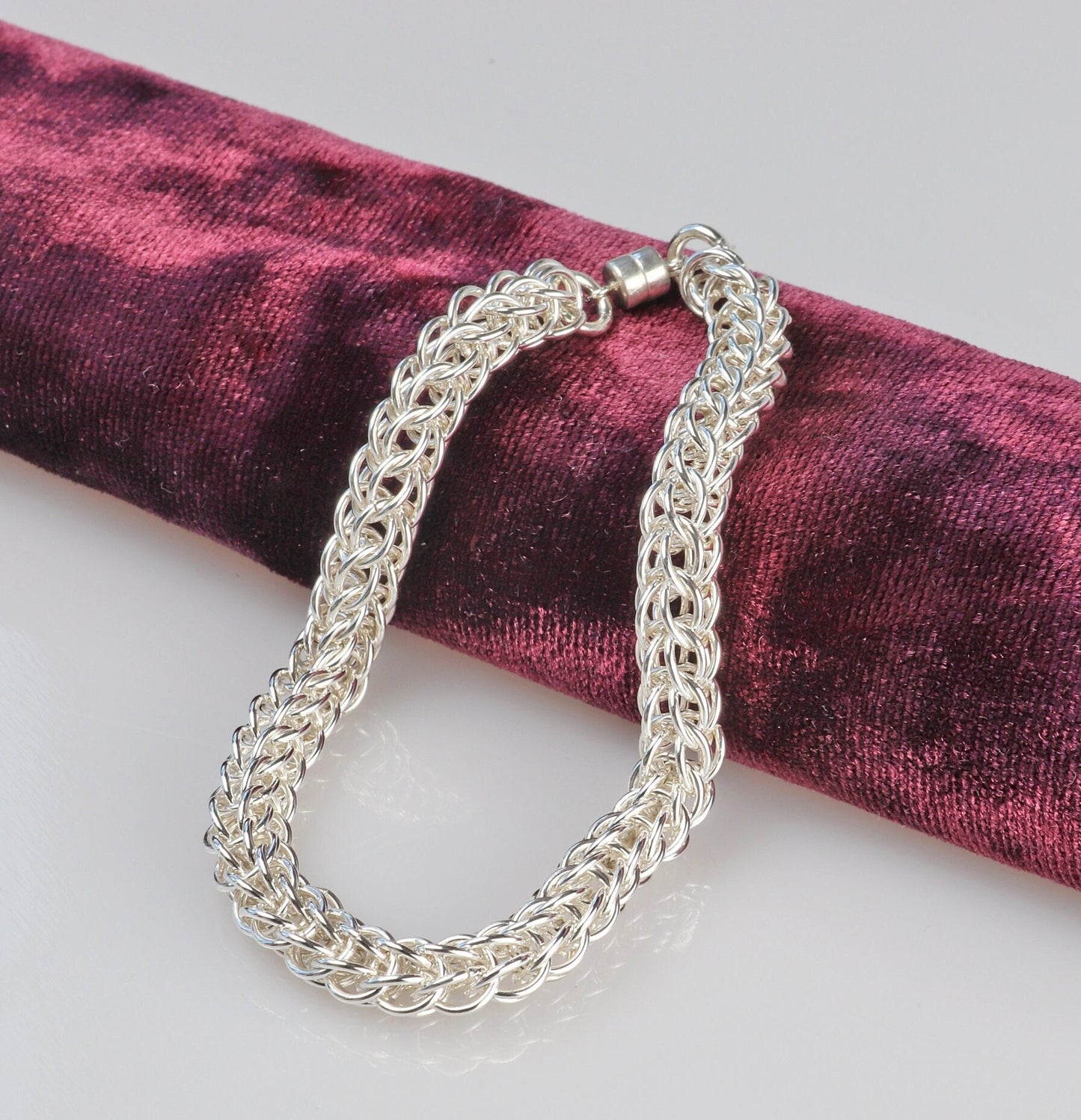 A 935 sterling Argentium Silver Full Persian Weave bracelet, crafted in our Missouri studio. This eye-catching versatile full Persian weave bracelet features a magnetic clasp that holds securely, yet opens and closes easily. Argentium 935 is known for its tarnish resistant hypoallergenic qualities and contains more pure silver than the typical .925 Sterling silver. 