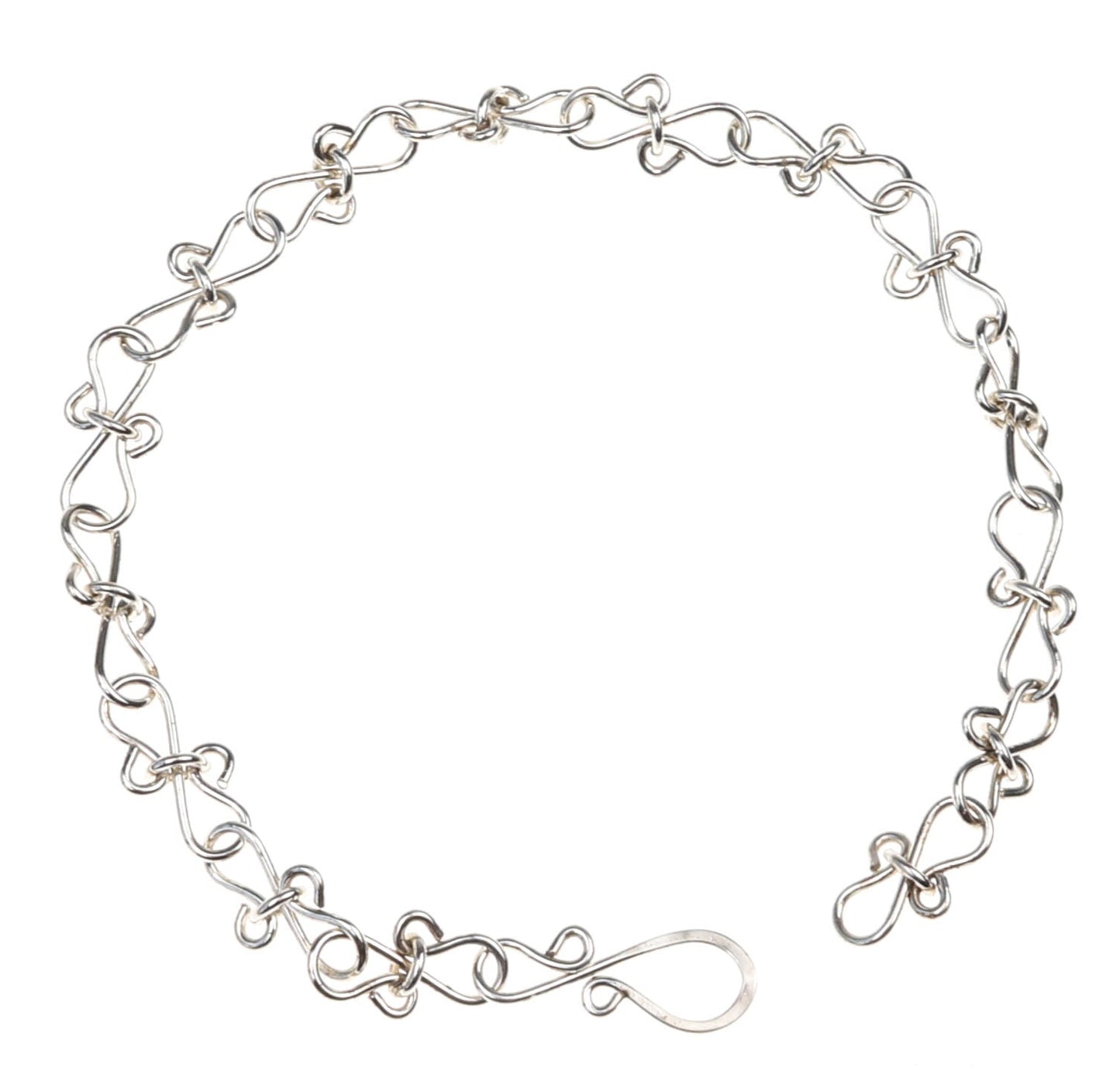 Silver chain bracelet on a white background