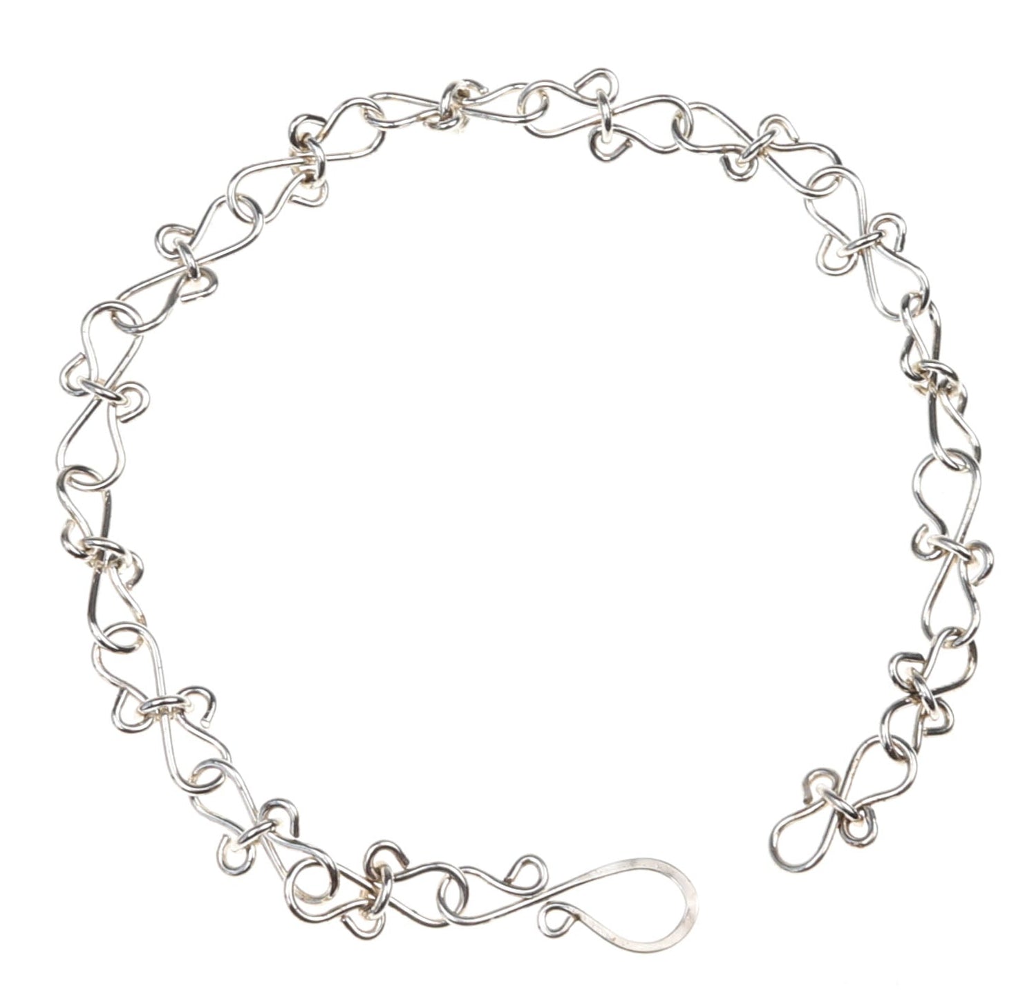 Silver chain bracelet on a white background