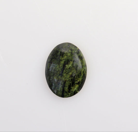 A small oval Forest Green Jasper cabochon gemstone with a dark green and black marbled pattern, centered on a plain white background.
