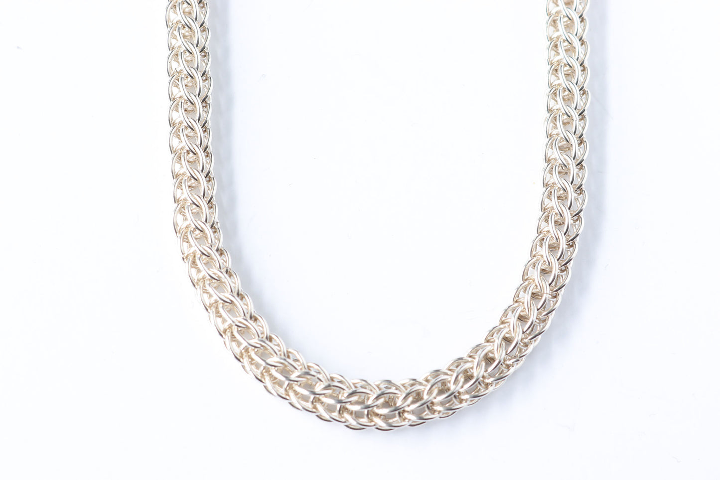 This Full Persian chainmail necklace in solid 20-gauge Argentium® 935 silver shown on white background.