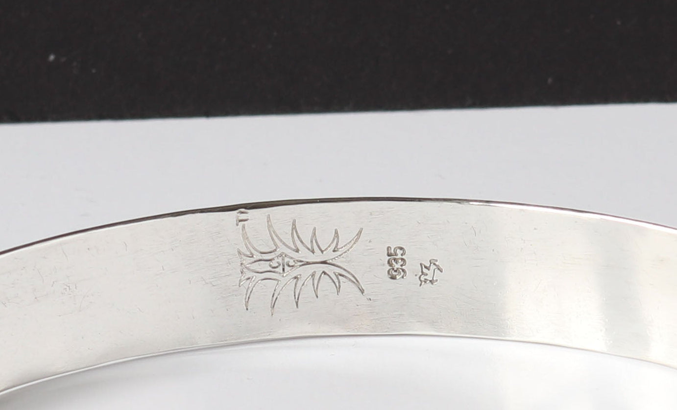 Close-up of makers mark and Argentium 935 hallmark
