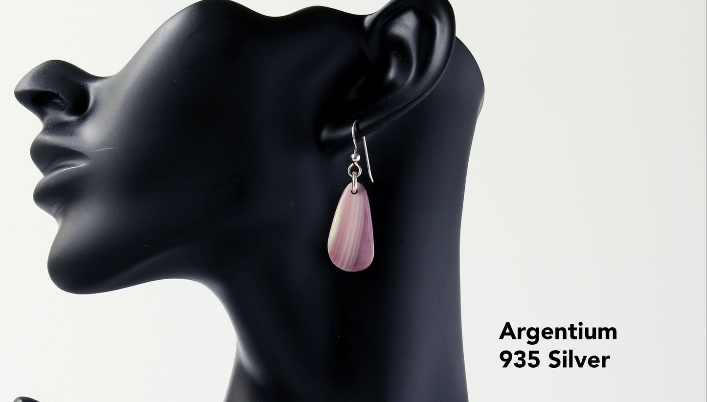 Introducing this exquisite pair of Lavender and Cream earrings in sterling Argentium 935 silver.  Shown on a black resin boutique jewelry manniquin against a light gray background.
