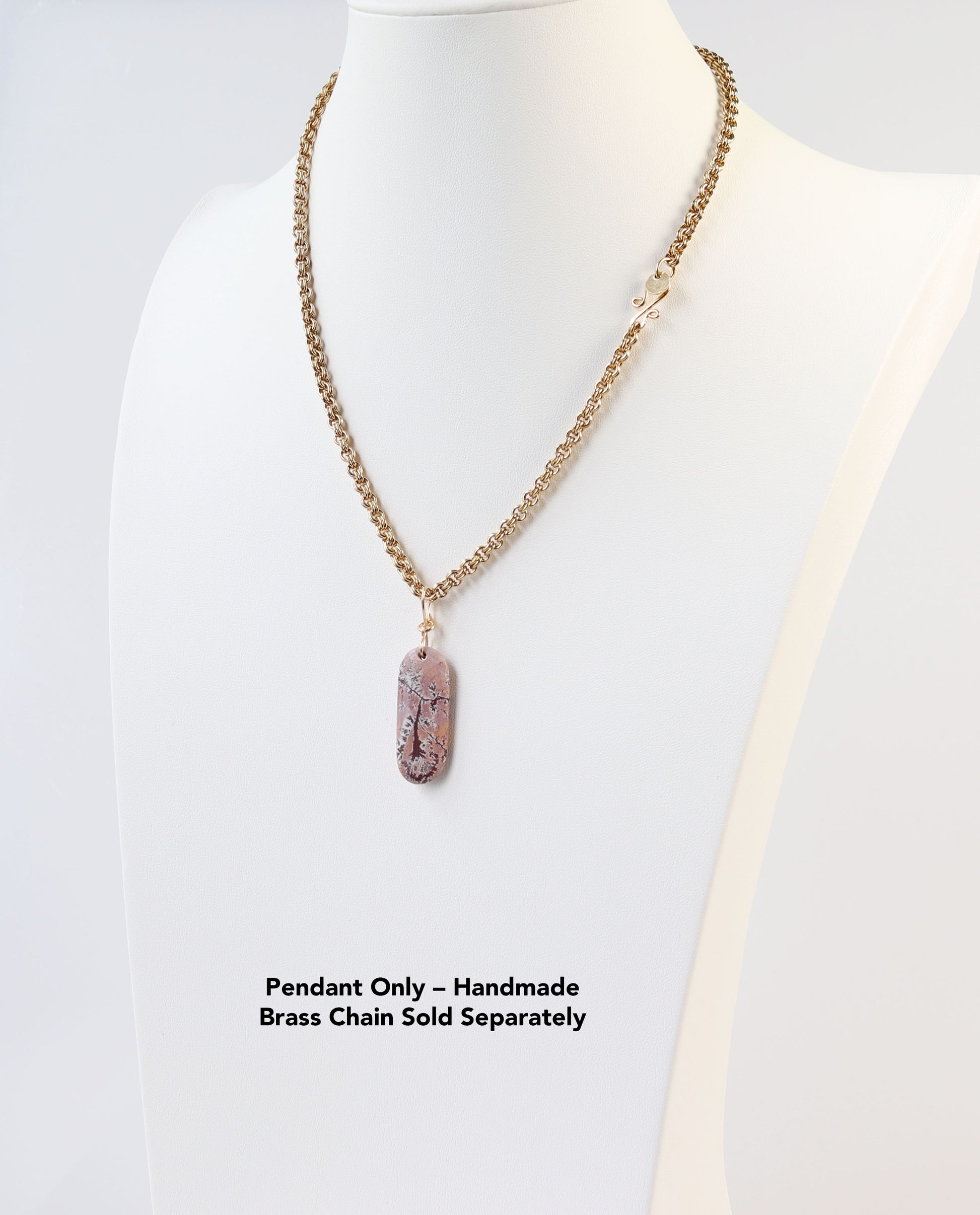Handcrafted Brass Double-Cable  Necklace shown with Dendritic Rhyolite Pendant Charm on a mannequin against a white background