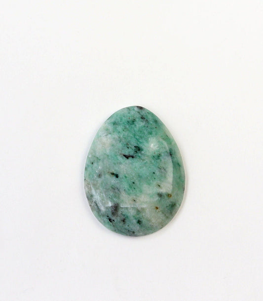 Hand-cut African Turquoise Jasper teardrop cabochon with natural teal-green, cream, and dark mineral patterning on a white background