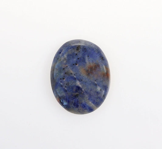 Hand-cut Blue Foidolite Sodalite oval cabochon with mottled blue, creamy white, gray, and warm brown natural patterns.  Shown against a white background.