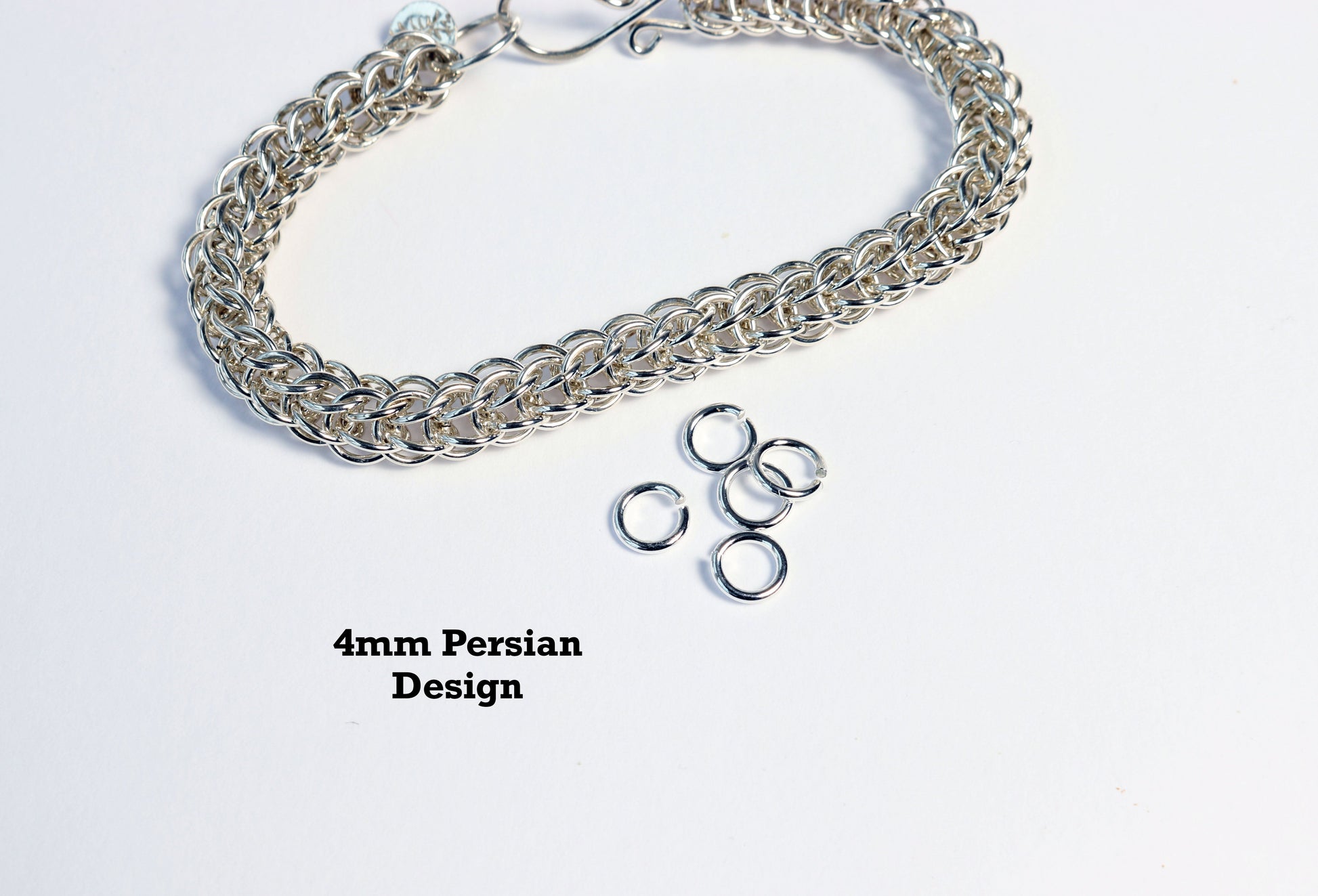 4mm Jump rings shown next persian bracelet that is crafted from these size jump rings that are made in our studio.