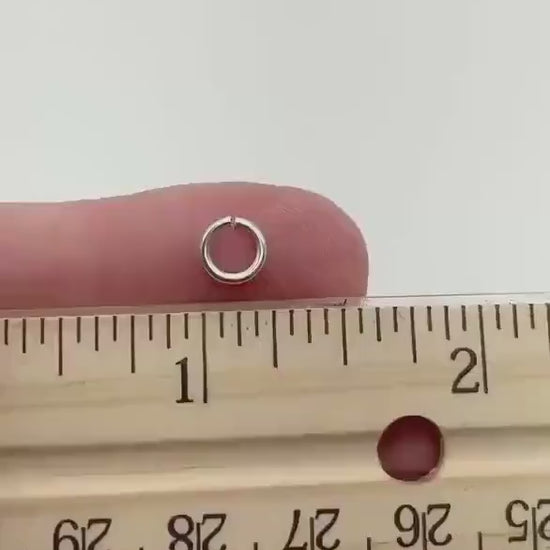 Video clip showing a 4mm jump ring next to a ruler for scale.