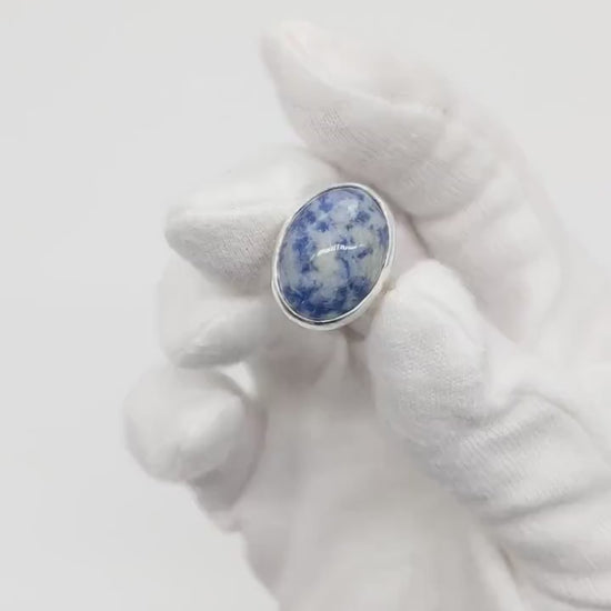 Demo Clip of Blue Sodalite Ring on human hand against white glove background