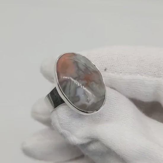 Demo clip of this Natural Crazy Lace Agate ring in solid Argentium 935 silver, size 7.75, in white gloved hand.