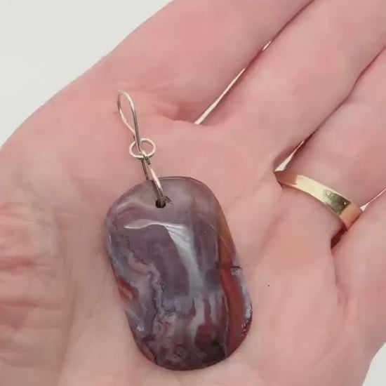 Demo clip showing Red Mexican agate tag shaped pendant with Argentium silver bail.