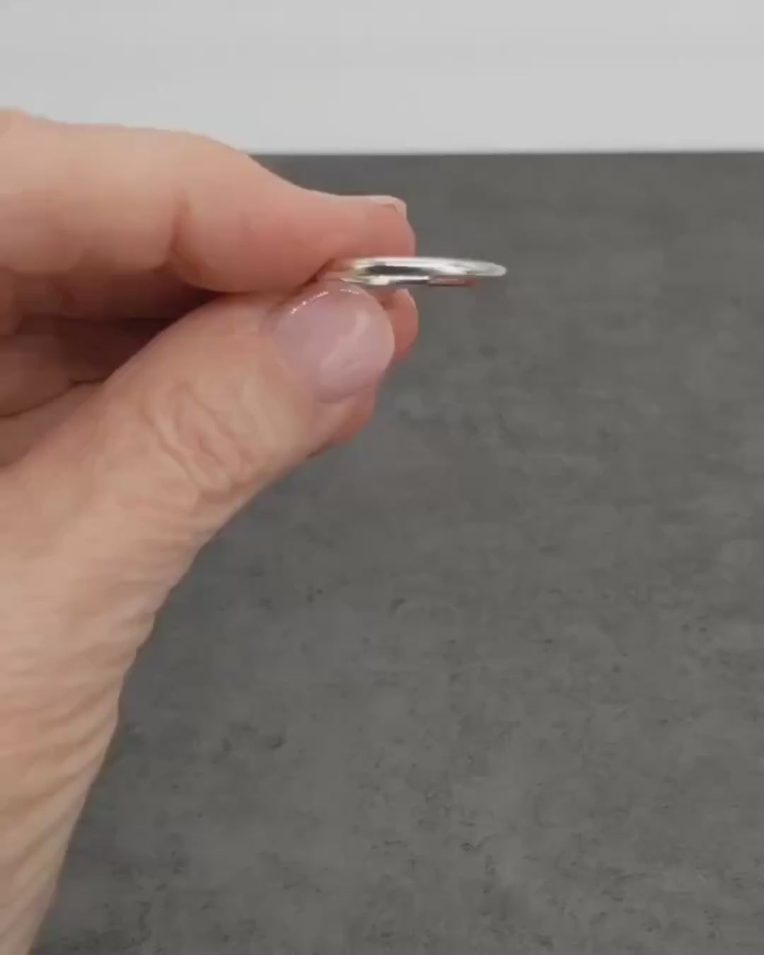 Demo Clip of Classic Round Ring—Handcrafted in solid durable 935 Argentium® silver, ensuring long-lasting quality. 