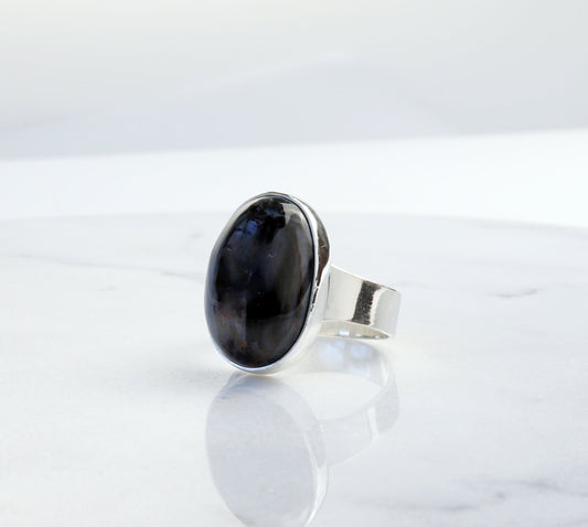 Side profile of handmade rainbow wood gemstone ring for men