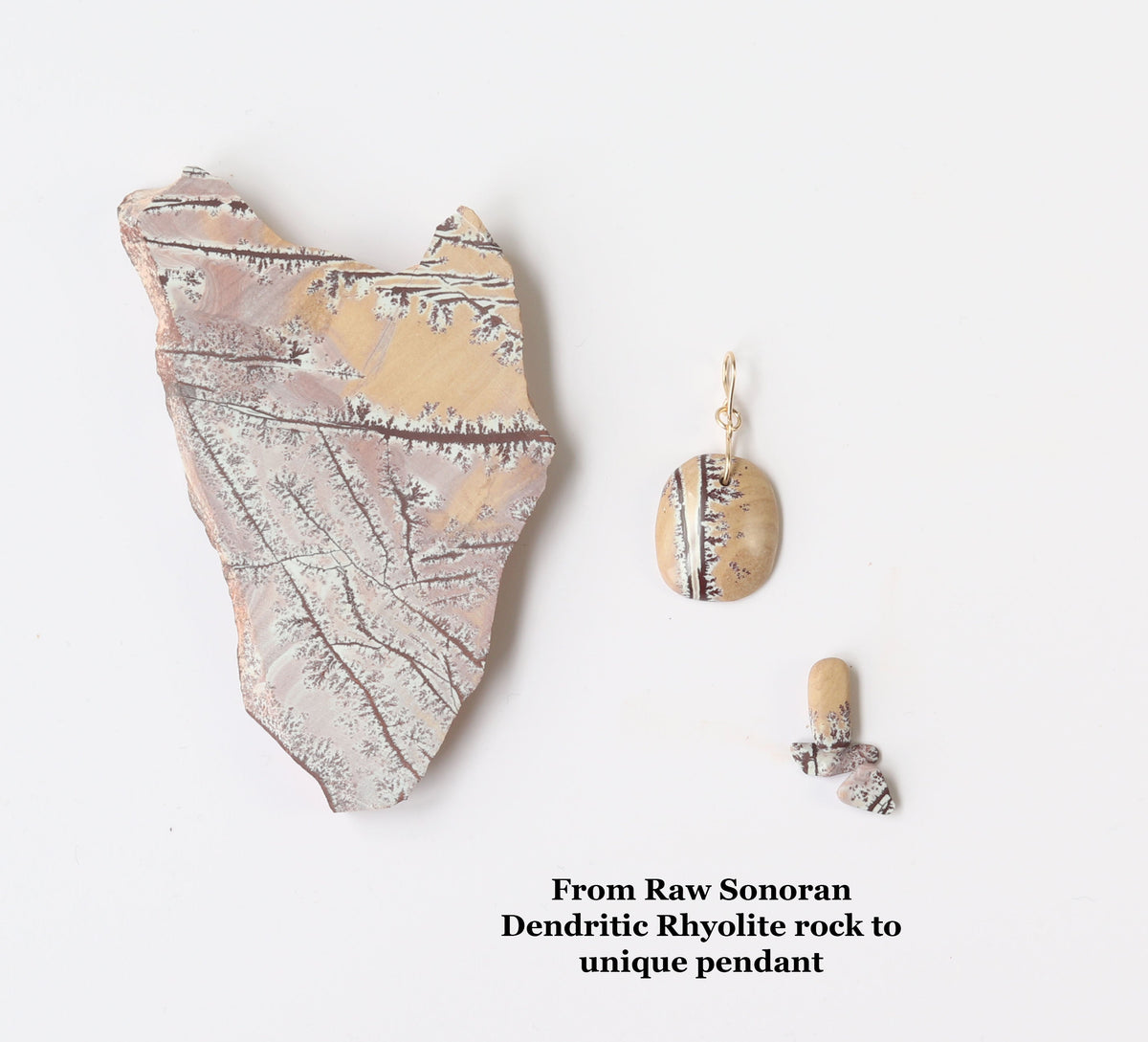 From Raw Sonoran Dendritic Rhyolite rock to unique pendant.  Pendant is shown next to the Rhyolite used to craft this pendant. Text overlay reads 'From Raw Sonoran Dendritic Rhyolite rock to unique pendant.'