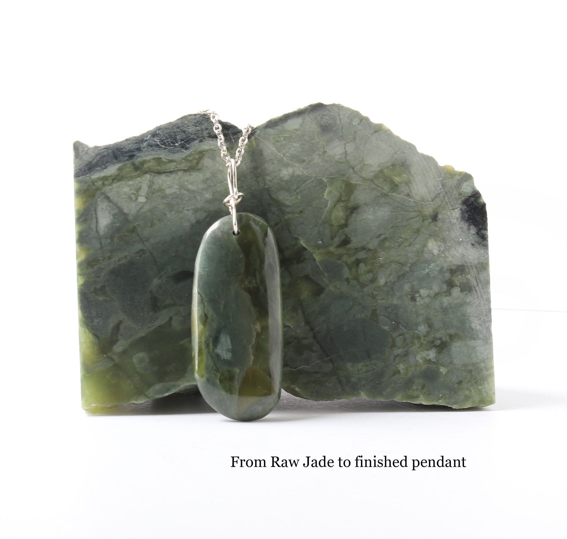 From raw Jade rock to finished pendant.  Shown the actual jade rock used to craft this pendant.