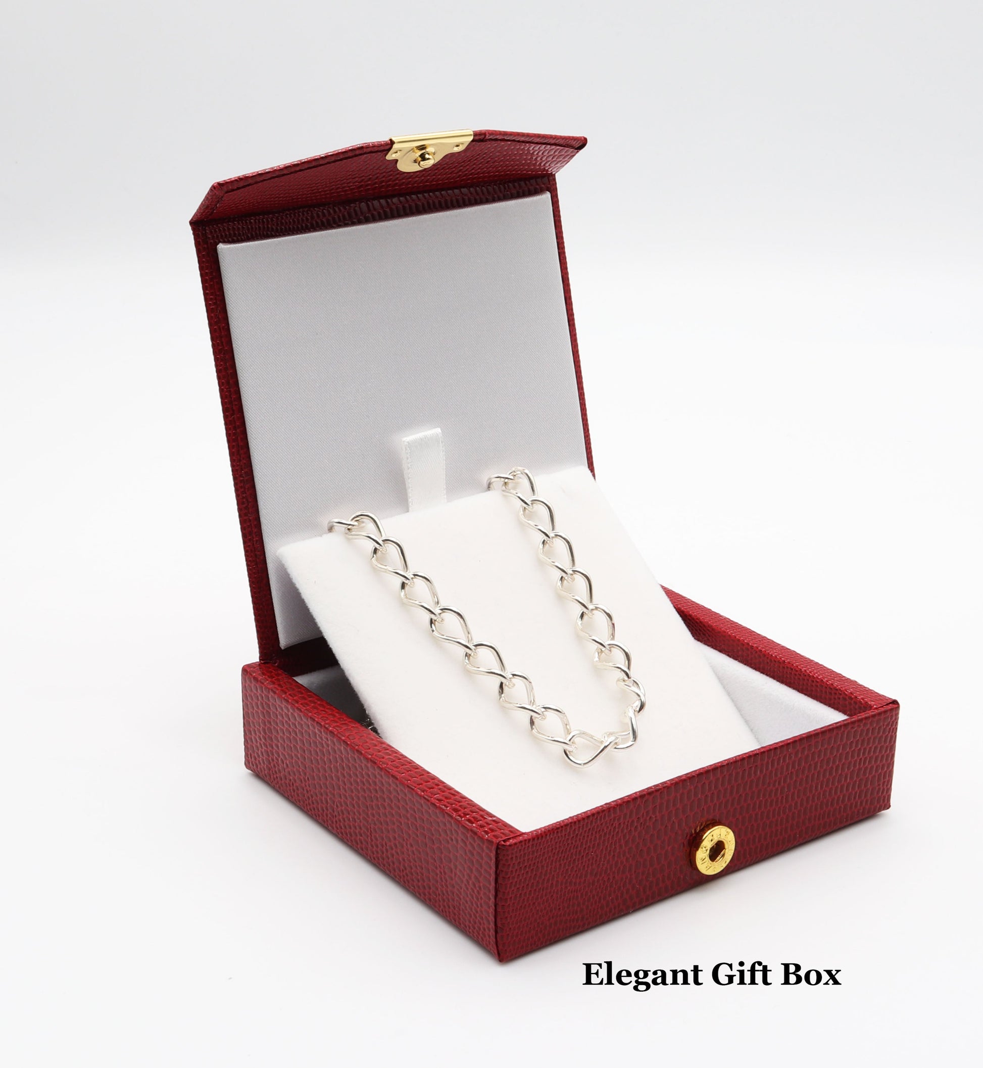 Oval Link Chain is Packaged in Red Faux Leather Gift box with white lining. Shown inside the gift box ready to gift.